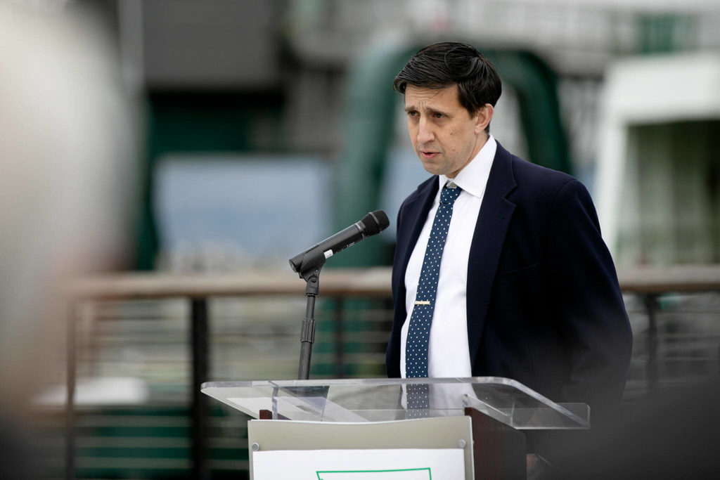 Rep. Alex Ramel speaks during the bill signing. (Ryan Berry / The Herald)
