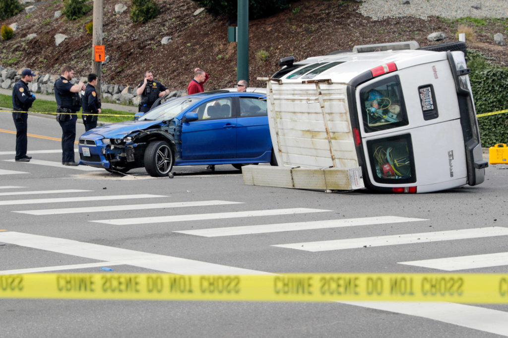 No one was reported injured in the three-vehicle collision. (Kevin Clark / The Herald)
