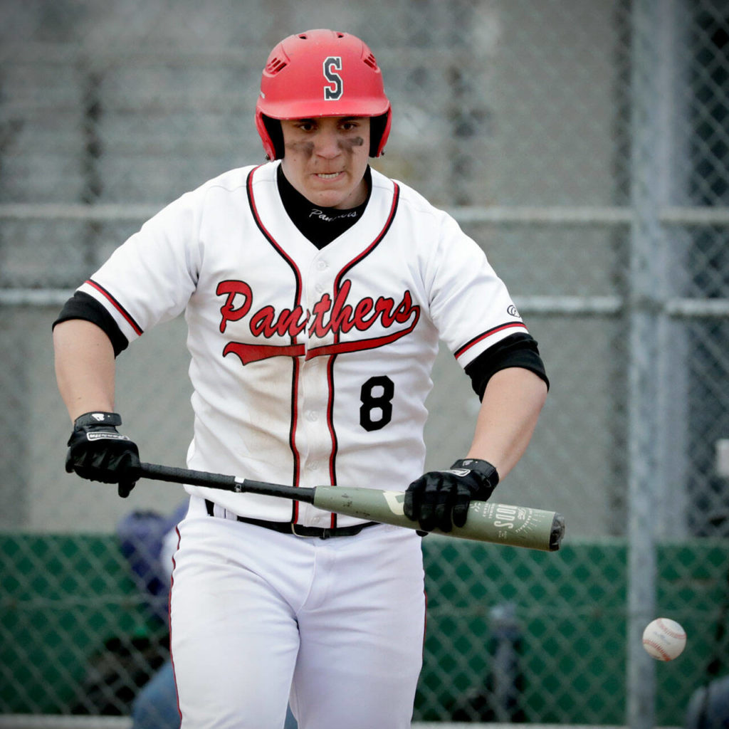 Snohomish’s Solomon Heineman reacts after striking out against Arlington Friday afternoon at Snohomish High School. The Eagles won 4-2. (Kevin Clark / The Herald)
