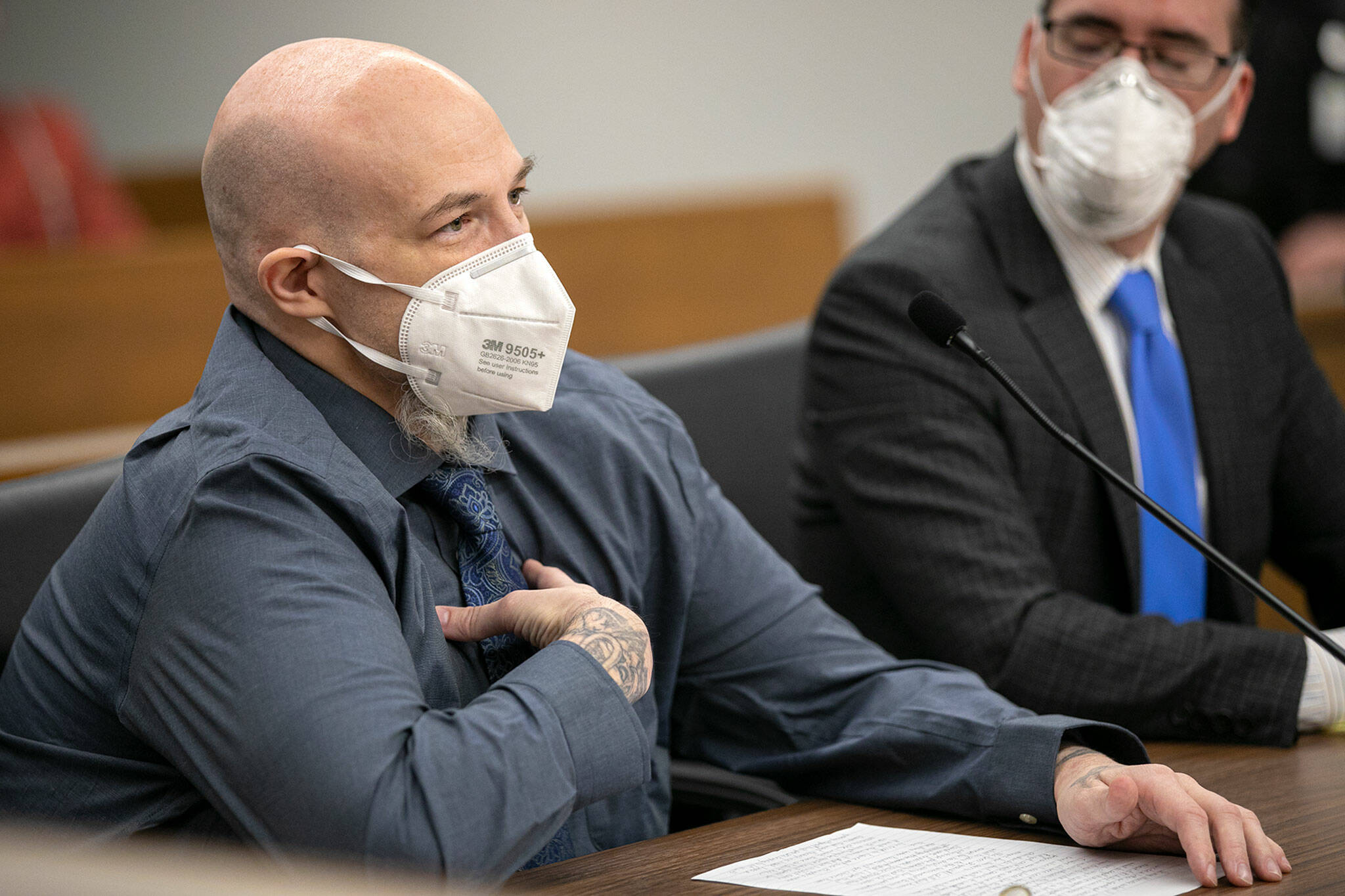 Eric Krueger, 46, who was convicted for his role in a 1997 double homicide in Marysville and originally sentenced to life in prison, speaks in court during his resentencing Tuesday at the Snohomish County Courthouse in Everett. (Ryan Berry / The Herald)