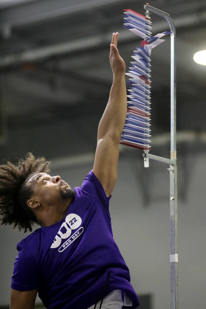 Kyler Gordon, an Archbishop Murphy High School graduate and University of Washington cornerback, records an unofficial 39.5-inch vertical during UW’s pro day Tuesday at the Dempsey Indoor Center in Seattle. (Ryan Berry / The Herald)
