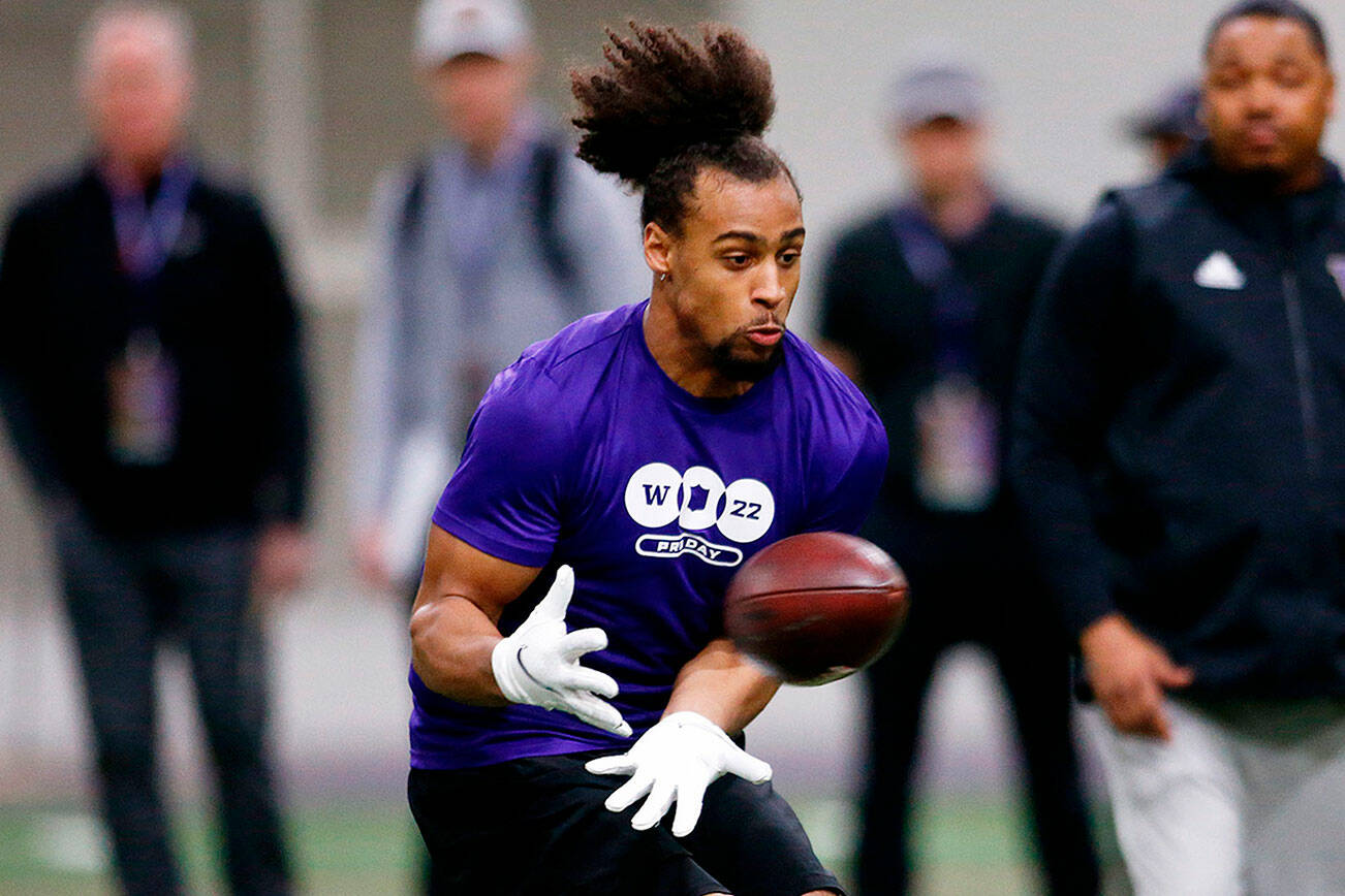 Kyler Gordon, an Archbishop Murphy High School graduate and University of Washington cornerback, catches a pass during positional drills at UW’s Pro Day Tuesday, March 29, 2022, at the Dempsey Indoor Center in Seattle, Washington. (Ryan Berry / The Herald)