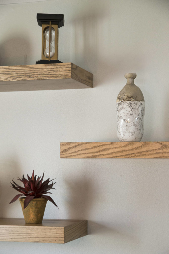 Kelly DuByne’s design uses floating shelves for a clean, contemporary look. (Andy Bronson)
