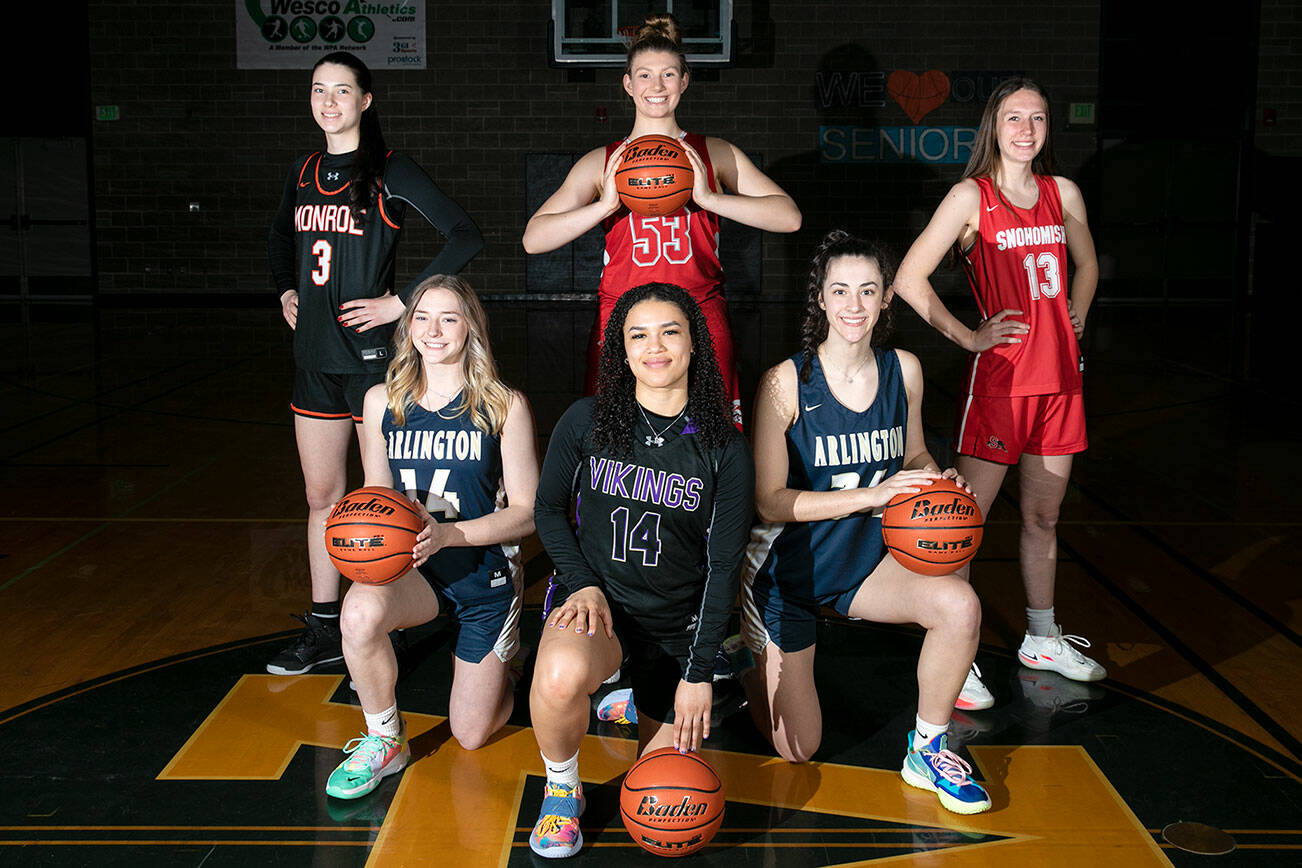 The 2022 All-Area girls basketball team, back row from left, Monroe’s Adria Lincoln, Stanwood’s Vivienne Barrett, Snohomish’s Ella Gallatin, and front row from left, Arlington’s Keira Marsh, Lake Stevens’ Baylor Thomas and Arlington’s Jenna Villa are pictured Sunday, March 27, 2022, in Arlington, Washington. (Ryan Berry / The Herald)
