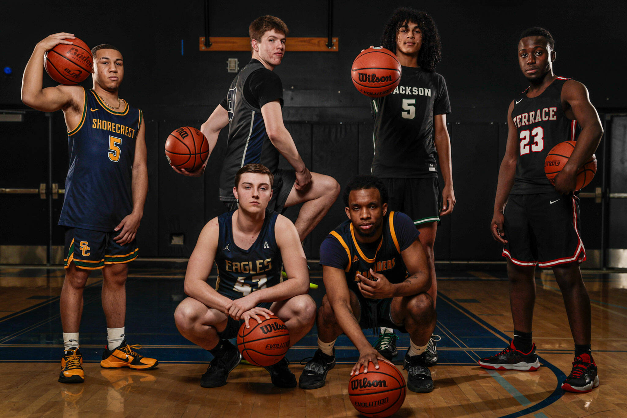 Shorecrest’s Elijah Johnson (standing, left) Glacier Peak’s Bobby Siebers, Jackson’s Sylas Williams, Mountlake Terrace’s Jeffrey Anyimah, Arlington’s Ethan Martin (front, left) and Mariner’s Naser Motley are The Herald’s All-Area first team. (Kevin Clark / The Herald)