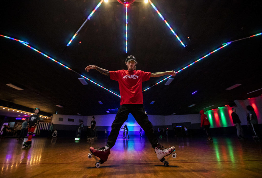 Joseph Cordell, a longtime patron of the Everett Skate Deck, demonstrates his skate moves during the final open skate session at the Everett Skate Deck on Sunday. (Olivia Vanni / The Herald)
