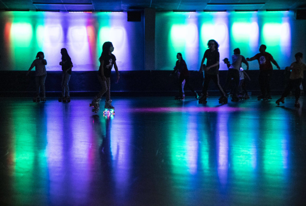 People skate during the final open skate session at the Everett Skate Deck on Sunday. (Olivia Vanni / The Herald)
