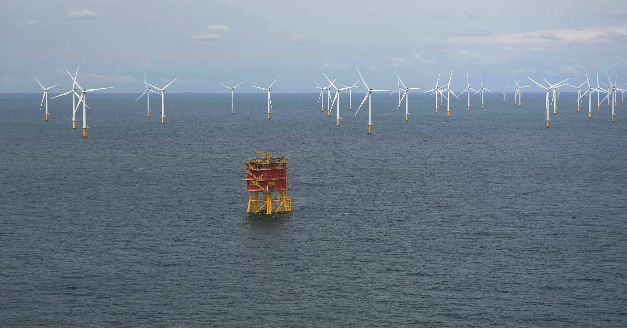 Wind turbines in the North Sea off of the Belgian coast. A similar project off the U.S. West Coast would require floating platforms. (Eric Herchaft, Pool Photo via AP)