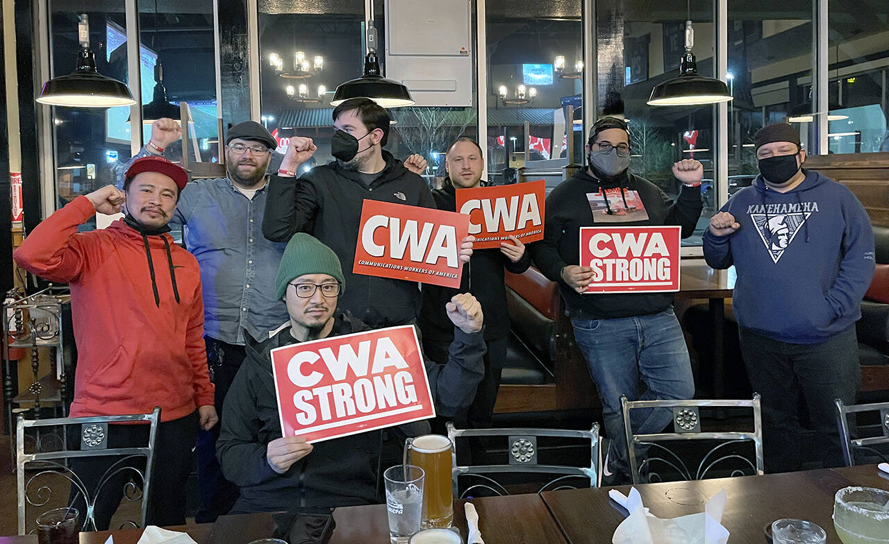 Workers from Lynnwood and Everett Verizon stores gather at an Everett restaurant on March 6, a day before they announced plans to unionize. (Contributed photo)