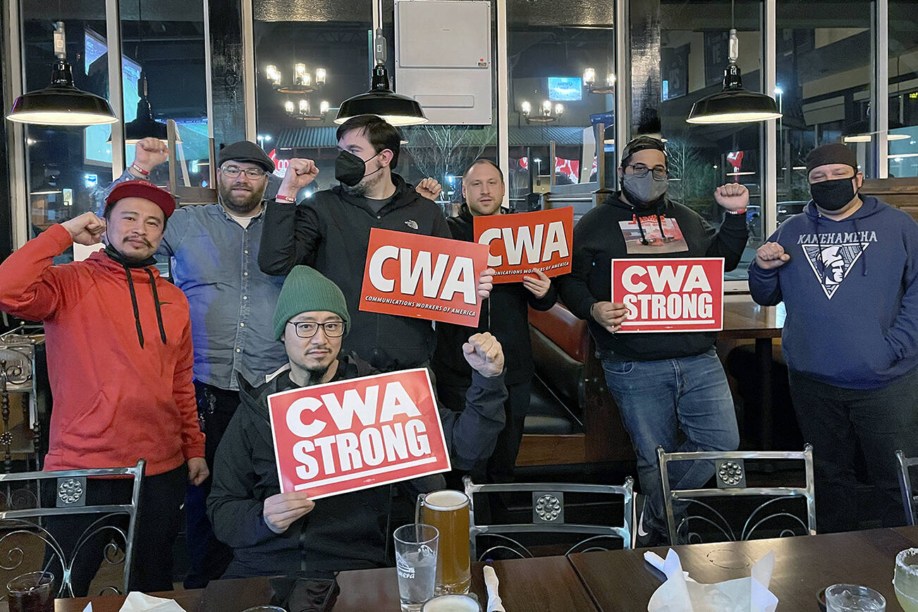 Workers from Lynnwood and Everett Verizon stores gather at an Everett restaurant on March 6, one day before they announced plans to unionize. (Contributed)