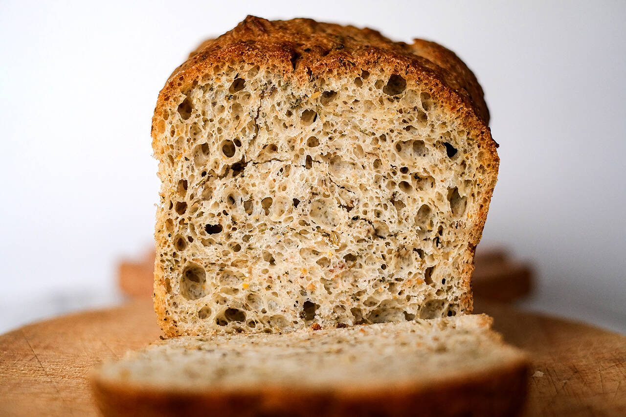 Catalyst Cafe in Everett carries gluten-free breads and other baked goods from Shambala Ancient Grain Bakery & Bistro in Mount Vernon, including this herbed garlic sourdough. Customers can place an order through Catalyst Cafe and pick up right in Everett. Wednesday, March 30, 2022. Taylor Goebel/The Herald.