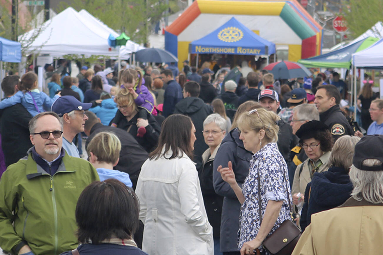 Crowds come out to Main Street in downtown Bothell during its April 2018 grand opening after a revitalization project. (Evan Pappas / Bothell-Kenmore Reporter, file)