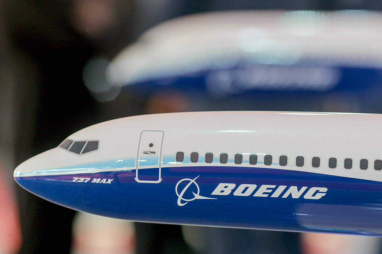A model of a Boeing Co. 737 Max aircraft at the company's pavilion during the Wings India 2022 Air Show held in Hyderabad, India, on March 24, 2022. MUST CREDIT: Bloomberg photo by Dhiraj Singh.
