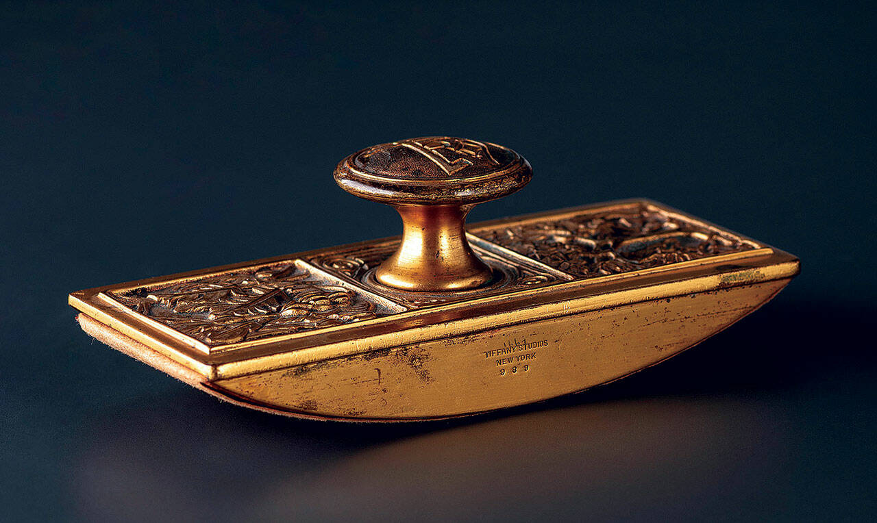 This rocker blotter sold for $161 at a Cowan’s auction. Today, it has more value as a piece of Tiffany craftsmanship than as a useful desk accessory.