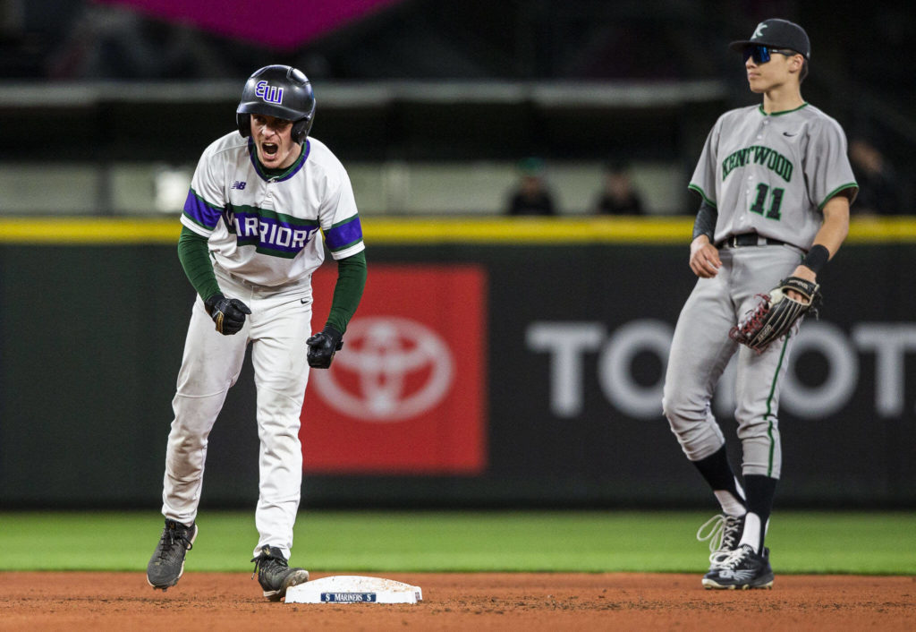 Edmonds-Woodway’s Jack Beers yells after hitting a double during the game against Kentwood at T-Mobile Park on Friday, April 8, 2022 in Seattle, Washington. (Olivia Vanni / The Herald)
