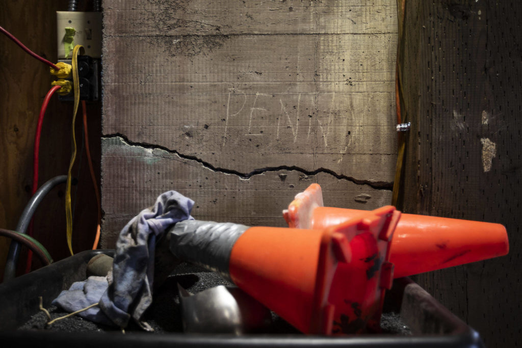 A large crack is visible on the wall of the bus barn in Sultan. (Olivia Vanni / The Herald)

