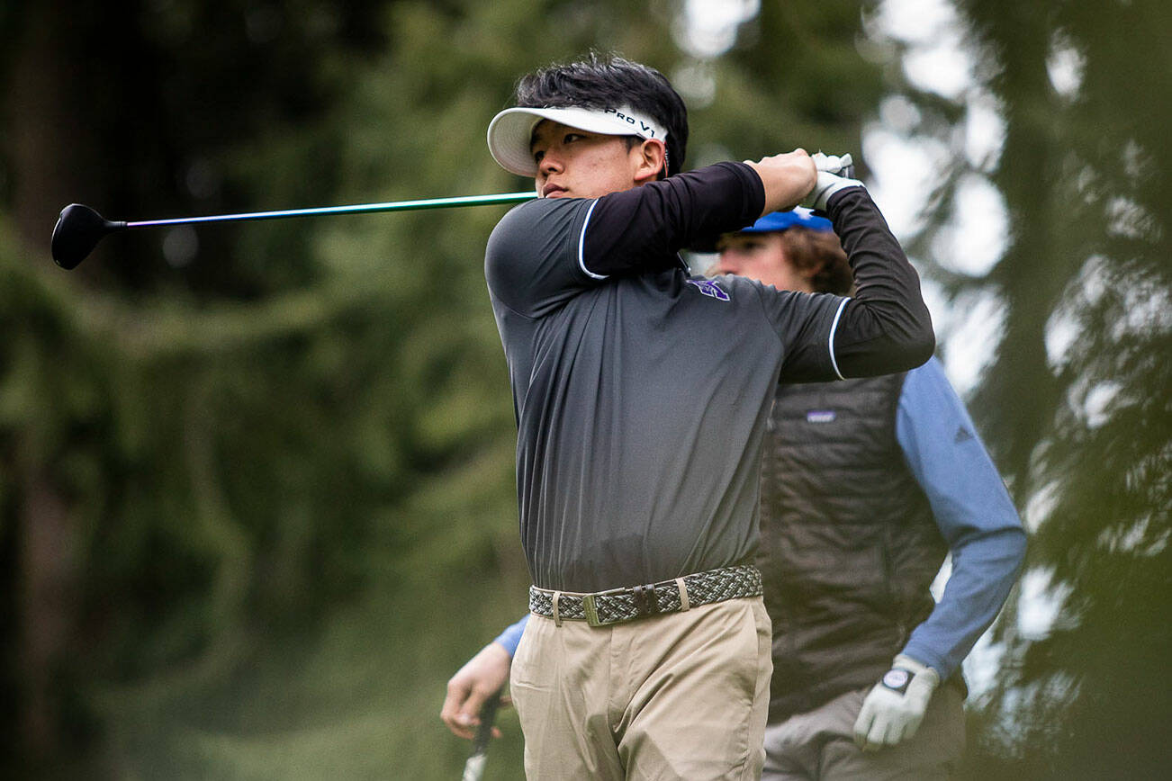 Kamiak’s Daniel Kim tees off at the Tom Dolan Memorial Invitational at the Everett Golf & Country Club on Monday, April 11, 2022 in Everett, Washington. (Olivia Vanni / The Herald)