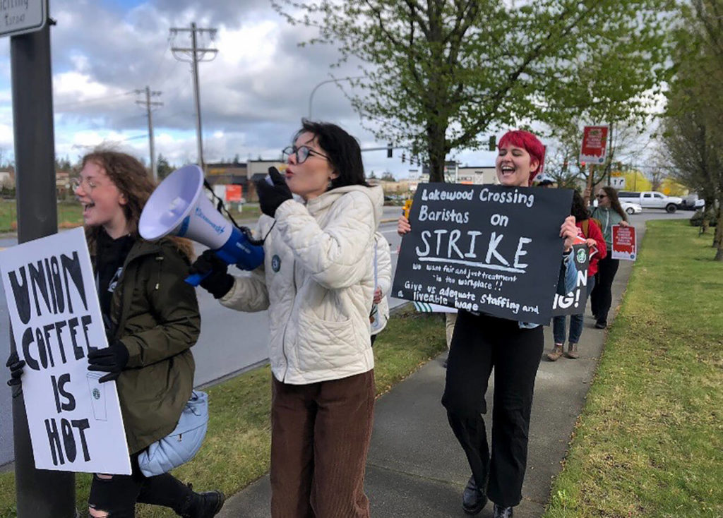 Starbucks employee and strike organizer Katie McCoy (center) and others demonstrate near the Lakewood Crossing store in Marysville. (Contributed)
