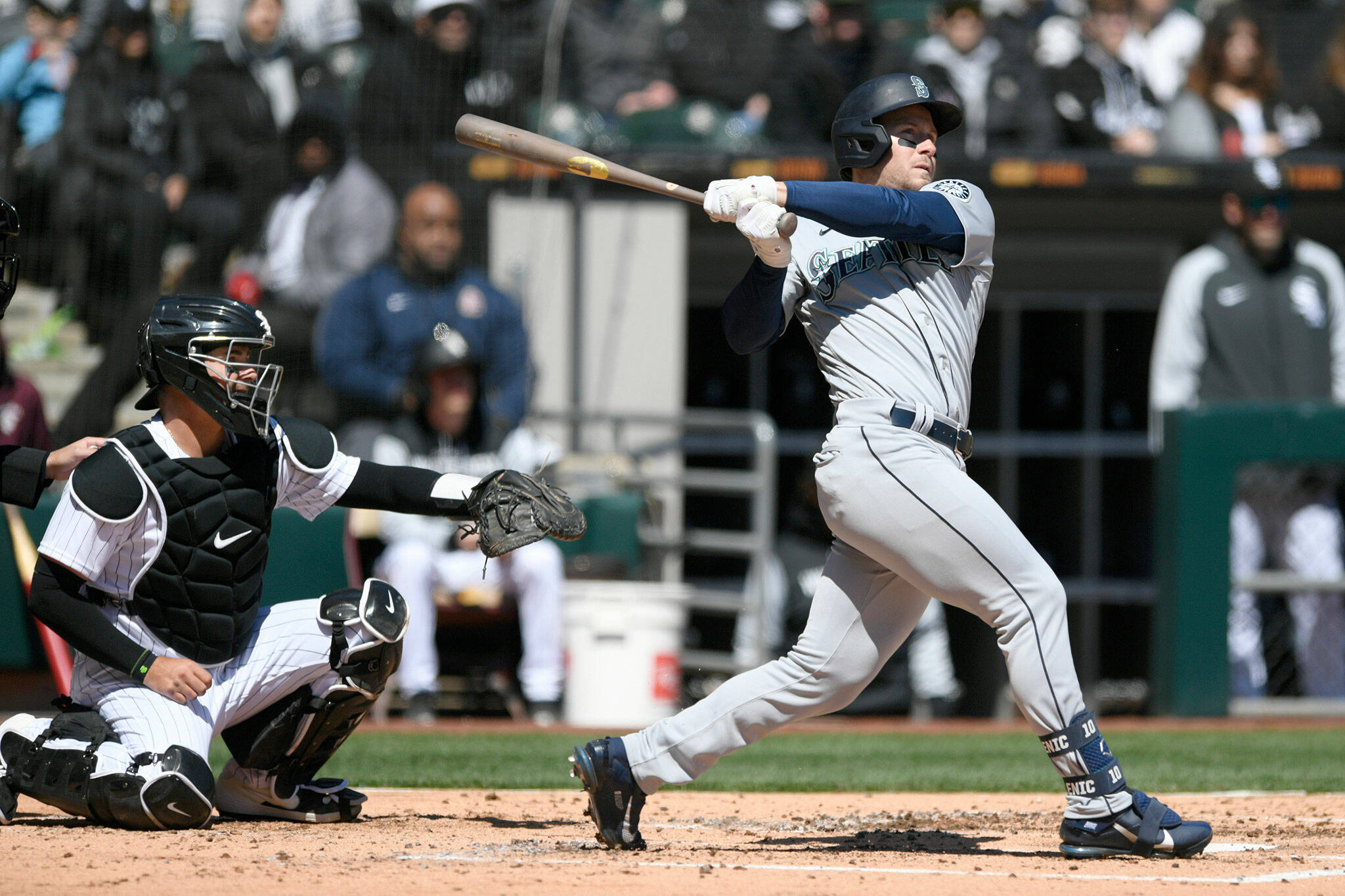The Mariners’ Jarred Kelenic watches his two-run home run during the second inning of a game against the White Sox on Thursday in Chicago. (AP Photo/Paul Beaty)