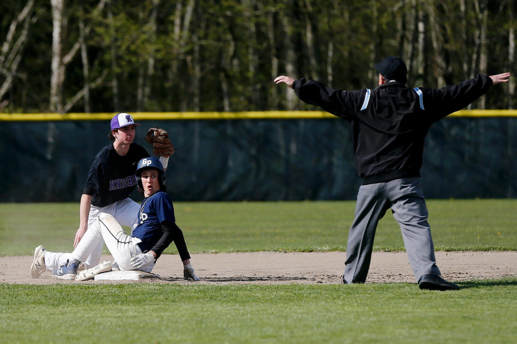Glacier Peak’s Bode Stevenson slides in safely at second base against Kamiak Friday, April 15, 2022, at Kamiak High School in Mukilteo, Washington. (Ryan Berry / The Herald)
