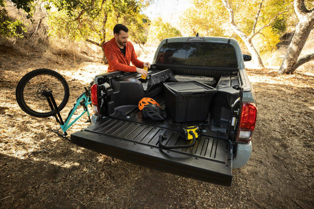 One of the two stowage compartments in the Toyota Tacoma SR5 Trail Edition bed is insulated for use as a cooler. (Manufacturer photo)
