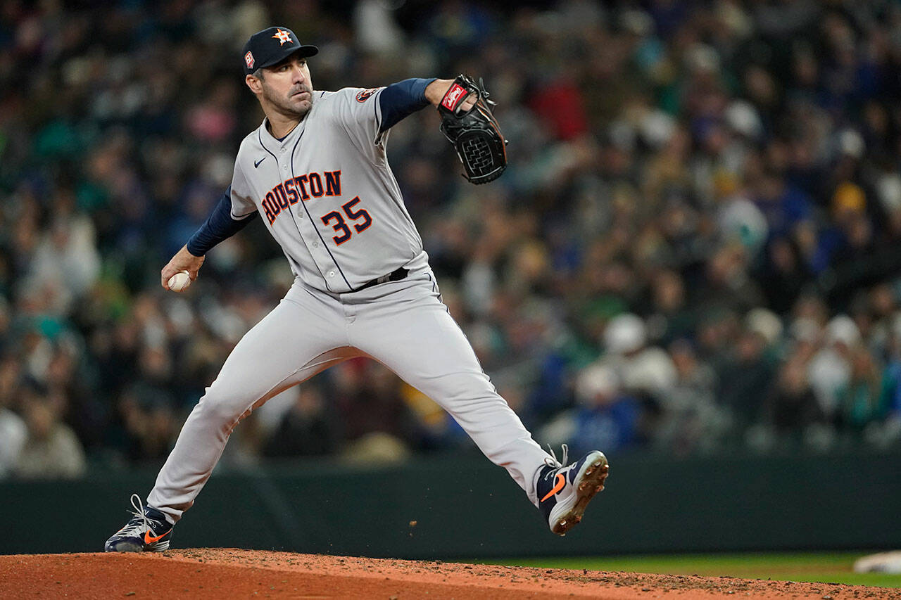 Houston Astros starting pitcher Justin Verlander throws against the Seattle Mariners during the sixth inning of a game in Seattle. (AP Photo/Ted S. Warren)