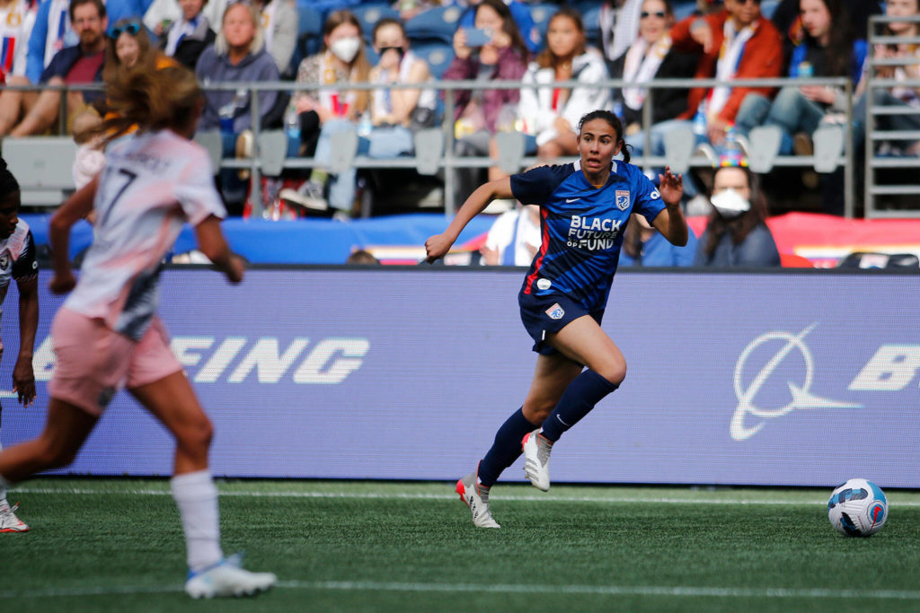 OL Reign’s Jimena Lopez runs the ball up the sideline during a NWSL Challenge Cup matchup against Angel City FC Sunday, April 17, 2022, at Lumen Field in Seattle, Washington. (Ryan Berry / The Herald)
