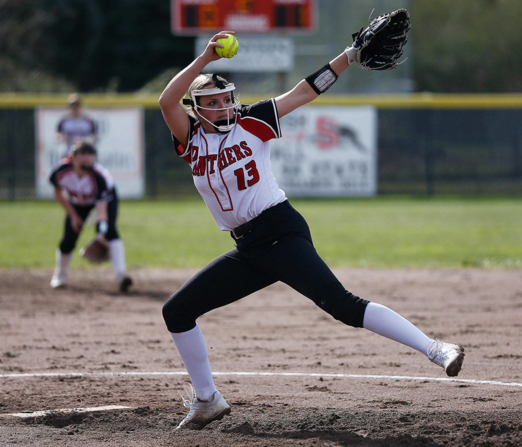 Snohomish’s Alex Flohr winds up while pitching against Arlington Tuesday, April 19, 2022, at Snohomish High School in Snohomish, Washington. (Ryan Berry / The Herald)
