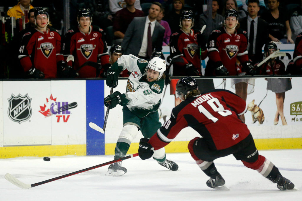 The Everett Silvertips’ Ronan Seeley tries a slap shot against the Vancouver Giants during the first round of the WHL playoffs Friday, April 22, 2022, at Angel of the Winds Arena in Everett, Washington. (Ryan Berry / The Herald)
