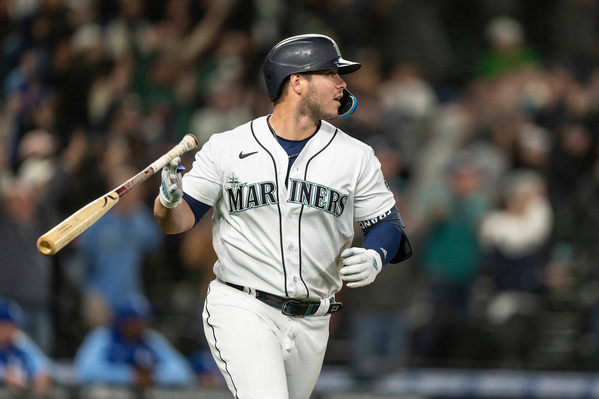 The Mariners’ Ty France flips his bat after hitting a three-run home run during the eighth inning of a game against the Royals on Saturday in Seattle. The Mariners won 13-7. (AP Photo/Stephen Brashear)