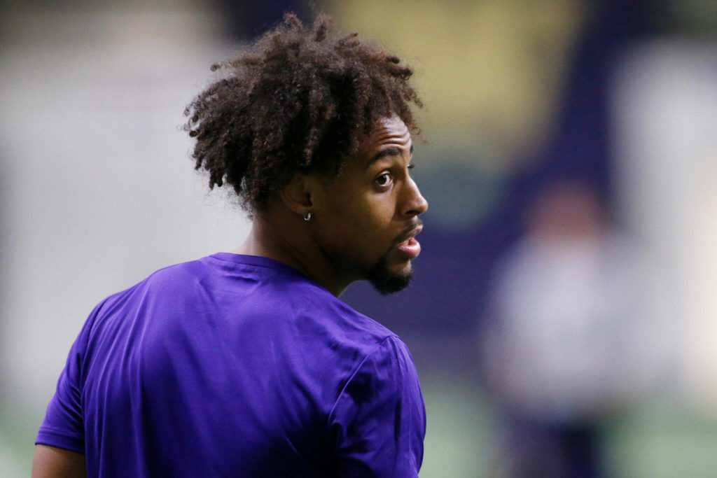 Kyler Gordon, an Archbishop Murphy High School graduate and University of Washington cornerback, rests between drills during UW’s Pro Day on March 29 at the Dempsey Indoor Center in Seattle. (Ryan Berry / The Herald)
