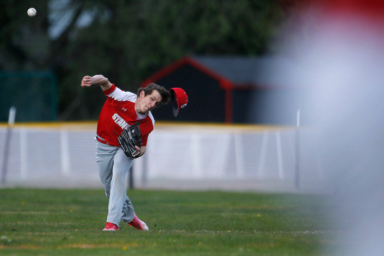 Stanwood’s Jordin Lee puts his body behind a throw to home against Archbishop Murphy Thursday, April 28, 2022, at Archbishop Murphy High School in Everett, Washington. (Ryan Berry / The Herald)