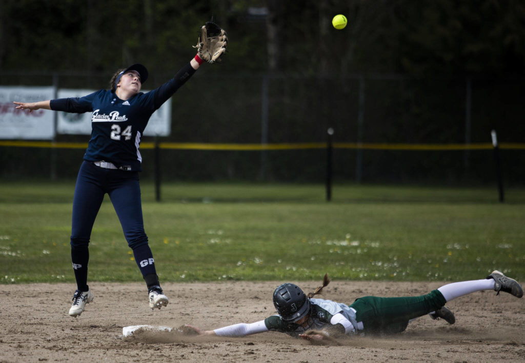 Jackson senior Avery Olson slides into second base during the Timberwolves’ 5-1 win over Wesco 4A rival Glacier Peak on Thursday afternoon. (Olivia Vanni / The Herald)
