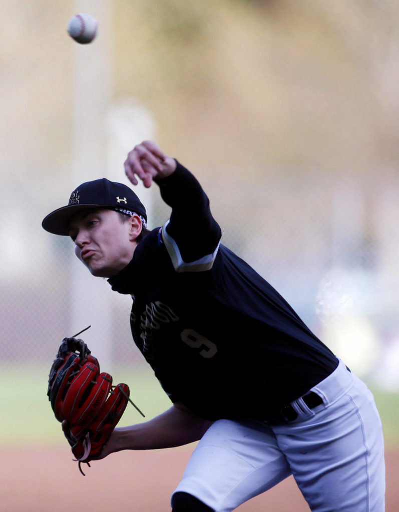 Lynnwood’s Keenan Masters throws a pitch against Meadowdale Friday, April 29, 2022, at Meadowdale High School in Lynnwood, Washington. (Ryan Berry / The Herald)
