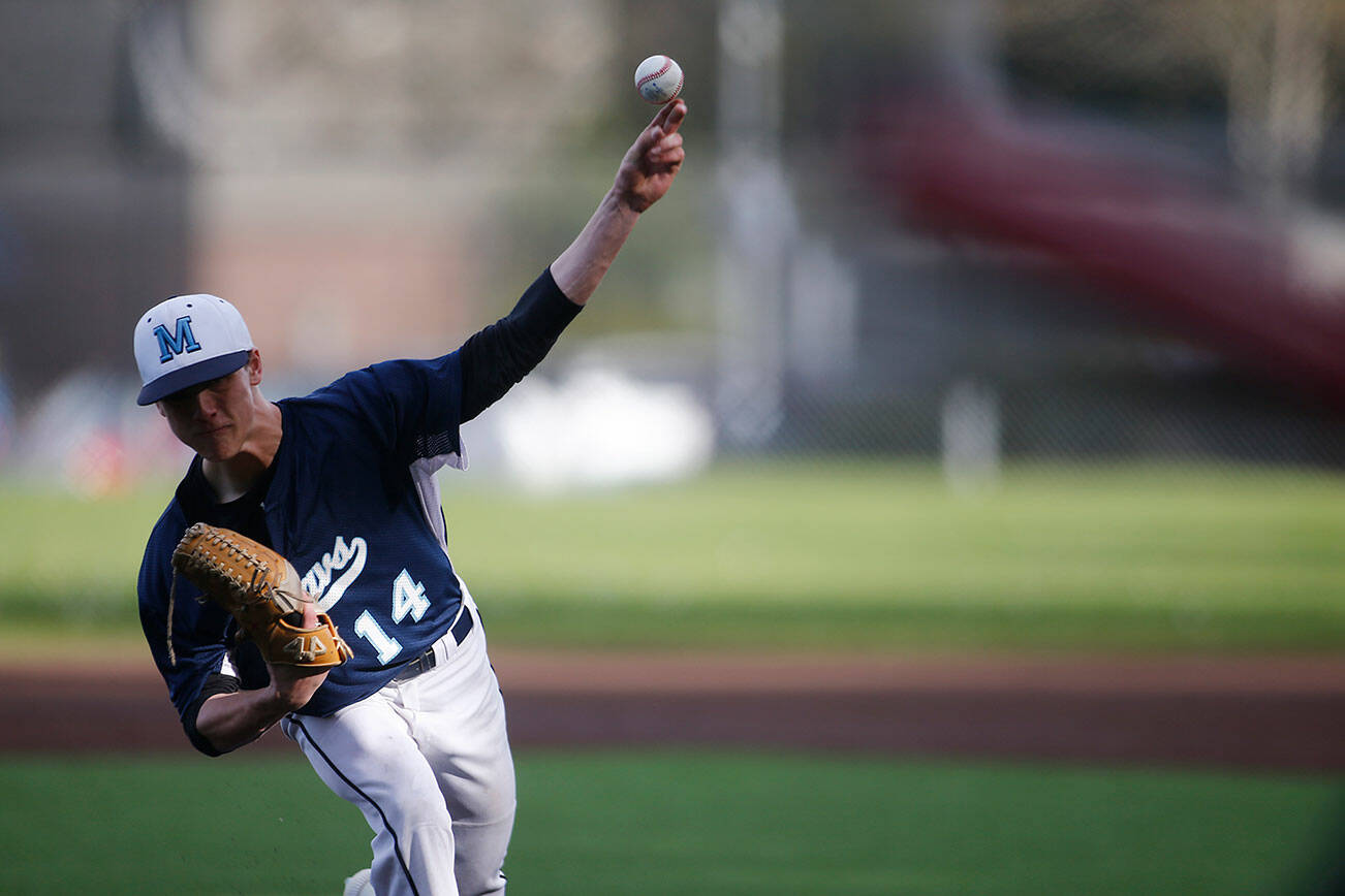 Meadowdale’s Broderick Bluhm finishes off a complete game shutout against Lynnwood Friday, April 29, 2022, at Meadowdale High School in Lynnwood, Washington. (Ryan Berry / The Herald)