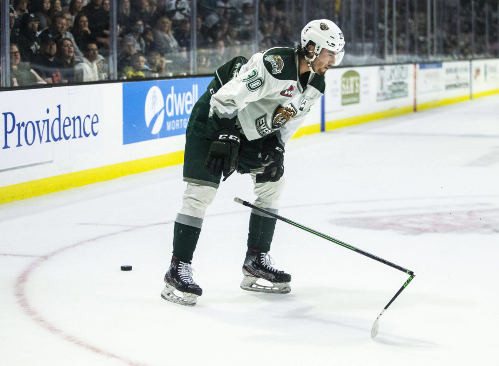 Silvertips’ Alex Swetlikoff breaks his stick on the ice in frustration at the end of the second period of the game against the Giants on Saturday, April 30, 2022 in Everett, Washington. (Olivia Vanni / The Herald)
