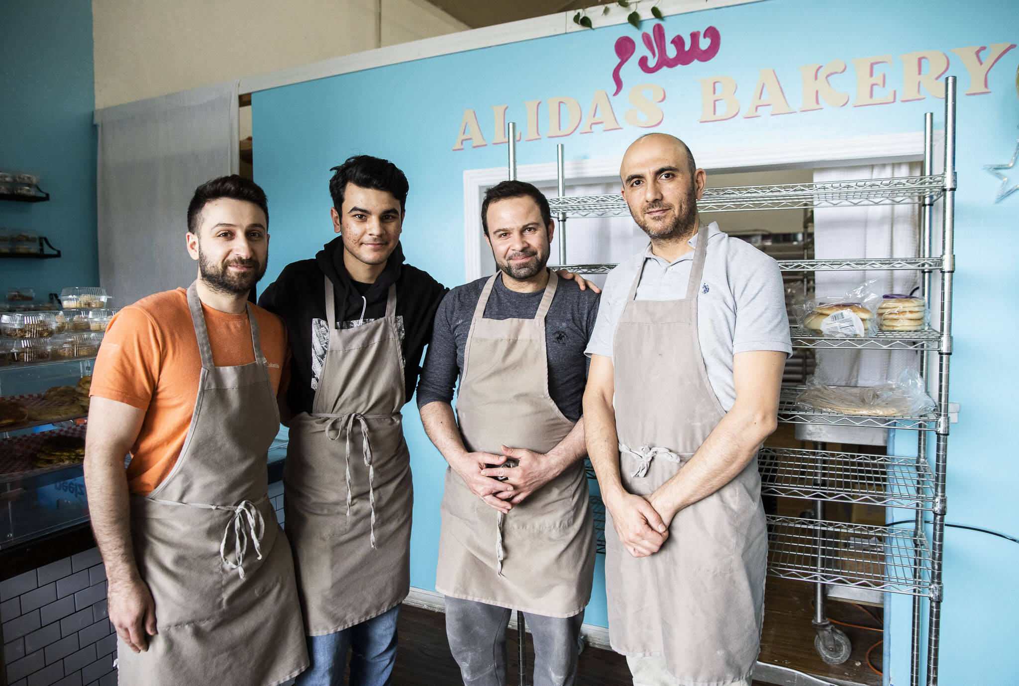 From left, bakers Nechirvan Zebari, Amer Ali, Sam Hamber and Marwan Adham at Alida’s Bakery in Everett. (Olivia Vanni / The Herald)