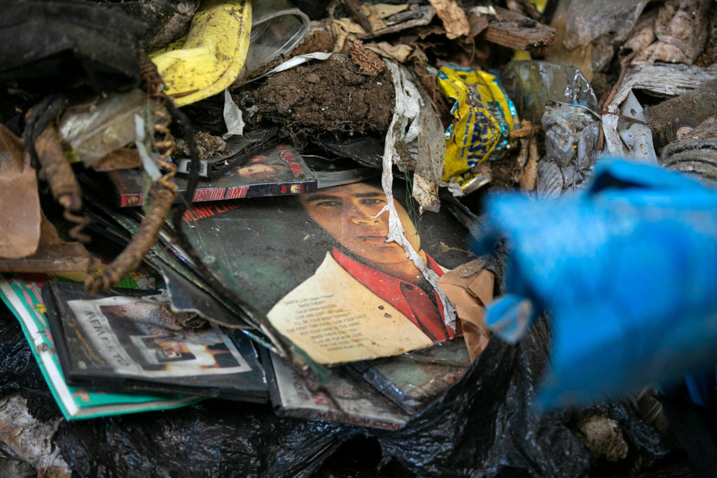 A vinyl pressing of Engelbert Humperdinck’s 1971 album “Sweetheart” sticks out the side of a massive pile of garbage Friday at the Airport Road Recycling and Transfer Station in Everett. (Ryan Berry / The Herald)
