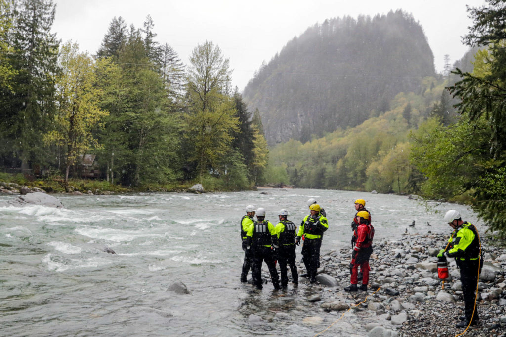 Firefighters from five agencies participated in the Snohomish Regional Fire & Rescue’s annual Water Rescue Academy in the Skykomish River on Thursday in Index. (Kevin Clark / The Herald)
