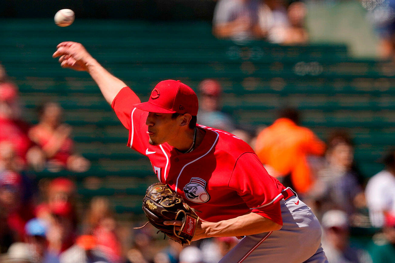 Cincinnati Reds starting pitcher Riley O'Brien throws against the Los Angeles Angels during the first inning of a spring training baseball game, Friday, April 1, 2022, in Tempe, Ariz. (AP Photo/Matt York)