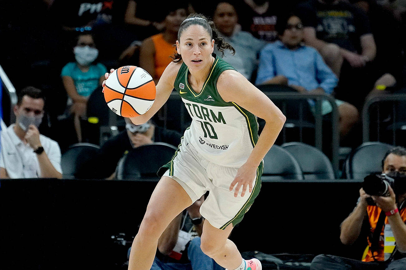 FILE - Seattle Storm guard Sue Bird (10) plays during the first half of the Commissioner's Cup WNBA basketball game against the Connecticut Sun, Thursday, Aug. 12, 2021, in Phoenix. Sue Bird announced Friday, Jan. 7, 2021, that she will return to the Seattle Storm next season, putting off retirement for at least one more year. (AP Photo/Matt York, File)