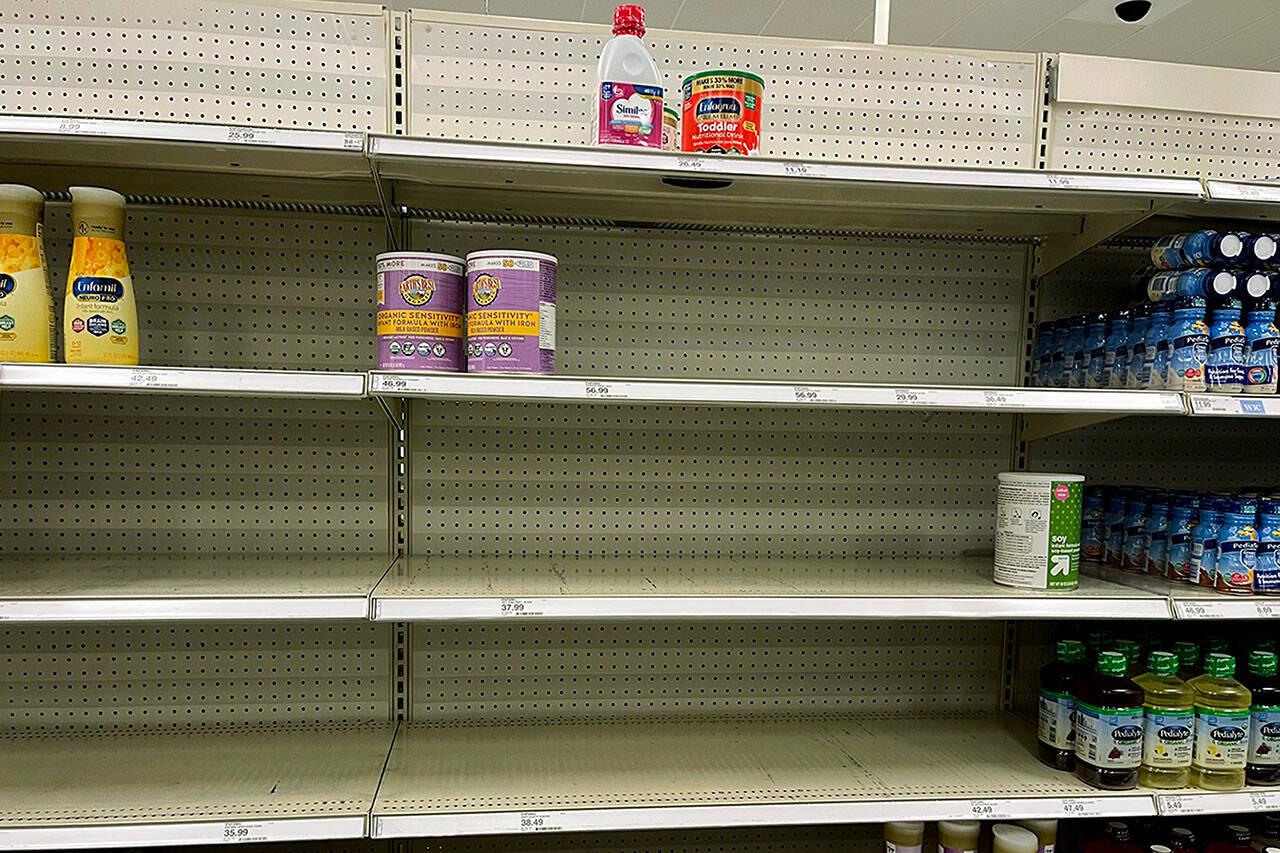 Empty shelves in the baby formula section at a grocery store in Lynnwood. (Jacqueline Allison / The Herald)