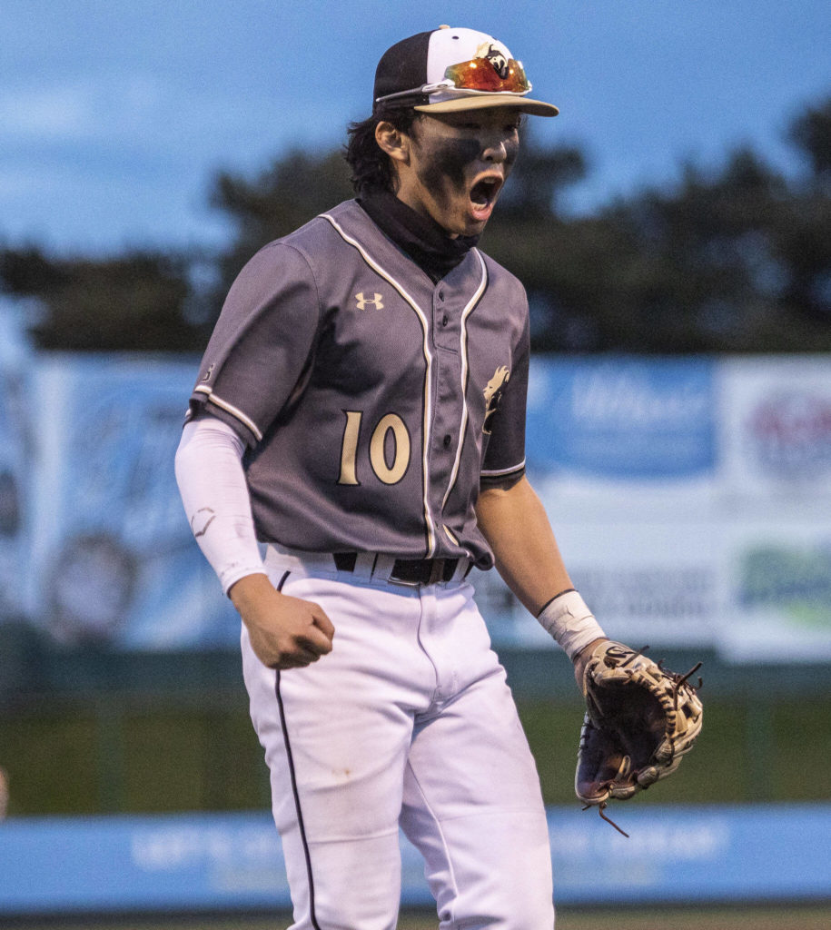 Lynnwood’s Leyon Camantigue reacts to a strikeout during the district semifinal game at Funko Field on Tuesday in Everett. (Olivia Vanni / The Herald)
