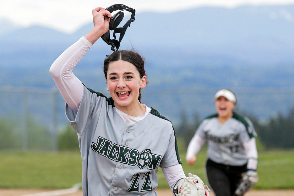 Jackson freshman Allie Thomsen celebrates the final out of the Timberwolves’ extra-inning win. (Kevin Clark / The Herald)
