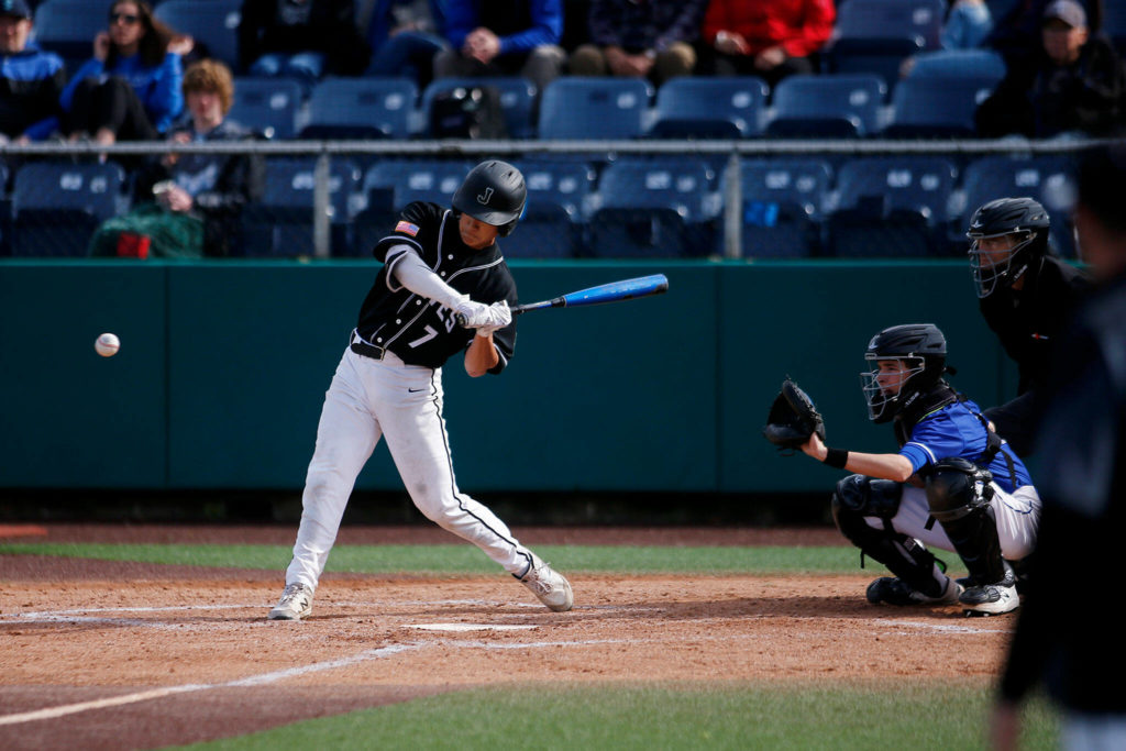 Jackson’s Ryan Nakajima takes a swing at a pitch against Bothell Friday, May 13, 2022, at Funko Field in Everett, Washington. (Ryan Berry / The Herald)
