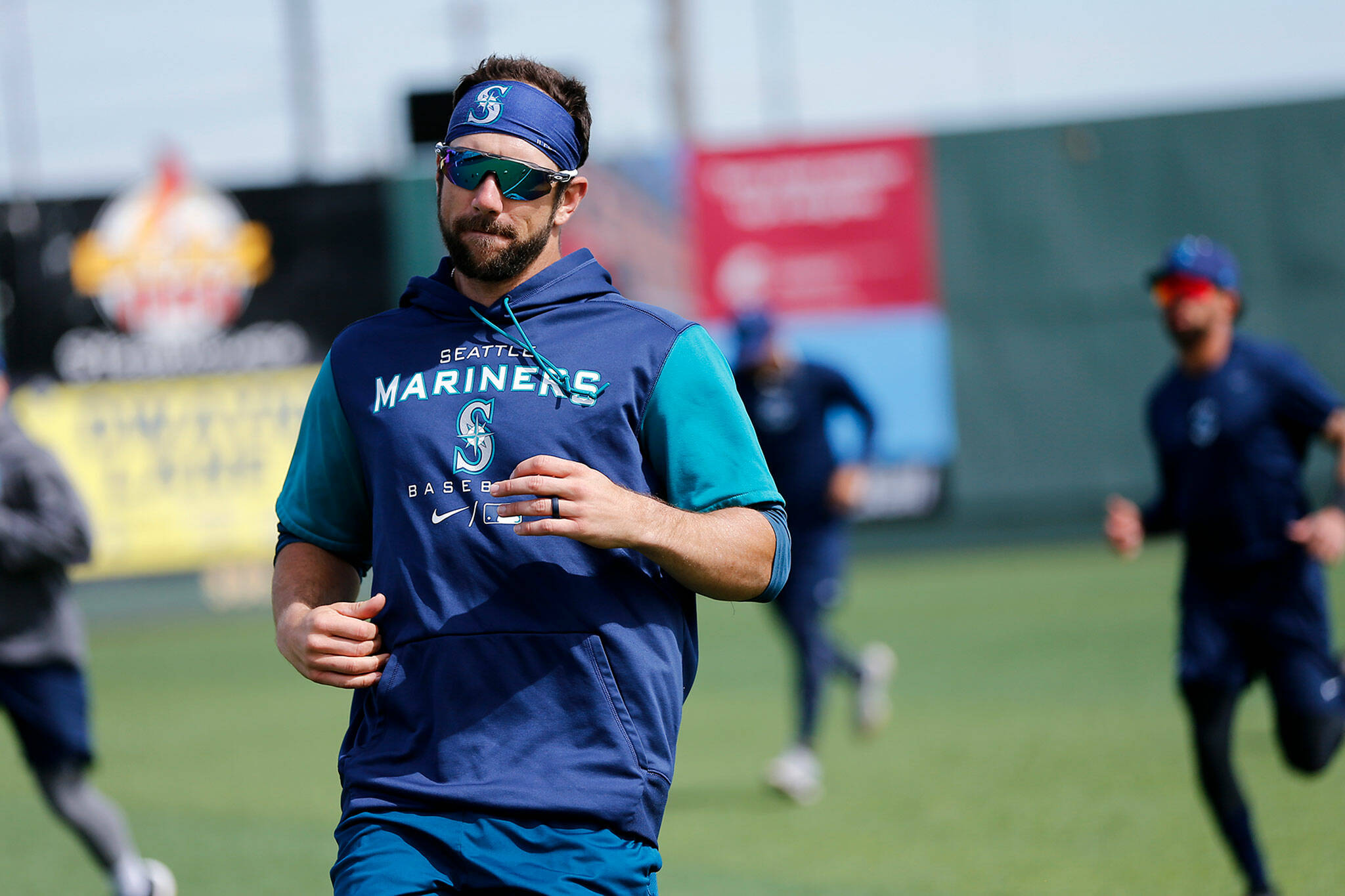 Everett native Steven Souza Jr. jogs with members of the AquaSox while visiting during a team workout on April 6 at Funko Field in Everett. (Ryan Berry / The Herald)
