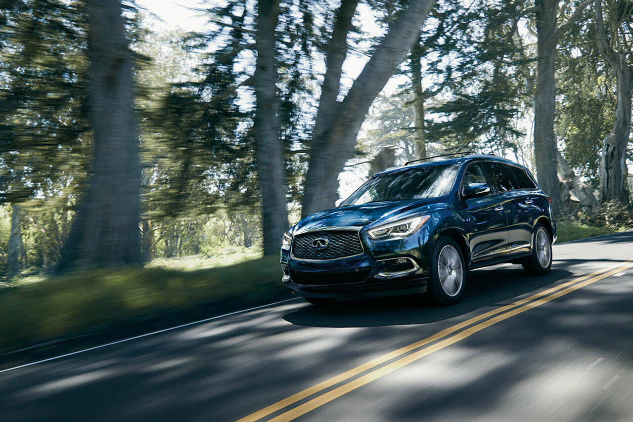 The 2022 Infiniti QX60 Sensory has seating for seven. Heated outboard second-row seats and power-return third-row seats are standard equipment.(Manufacturer photo)