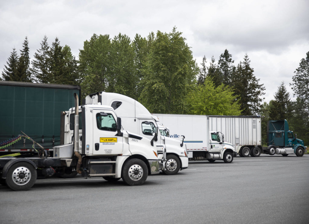 Trucks park at the Smokey Point Rest Area on Tuesday in Arlington. (Olivia Vanni / The Herald)
