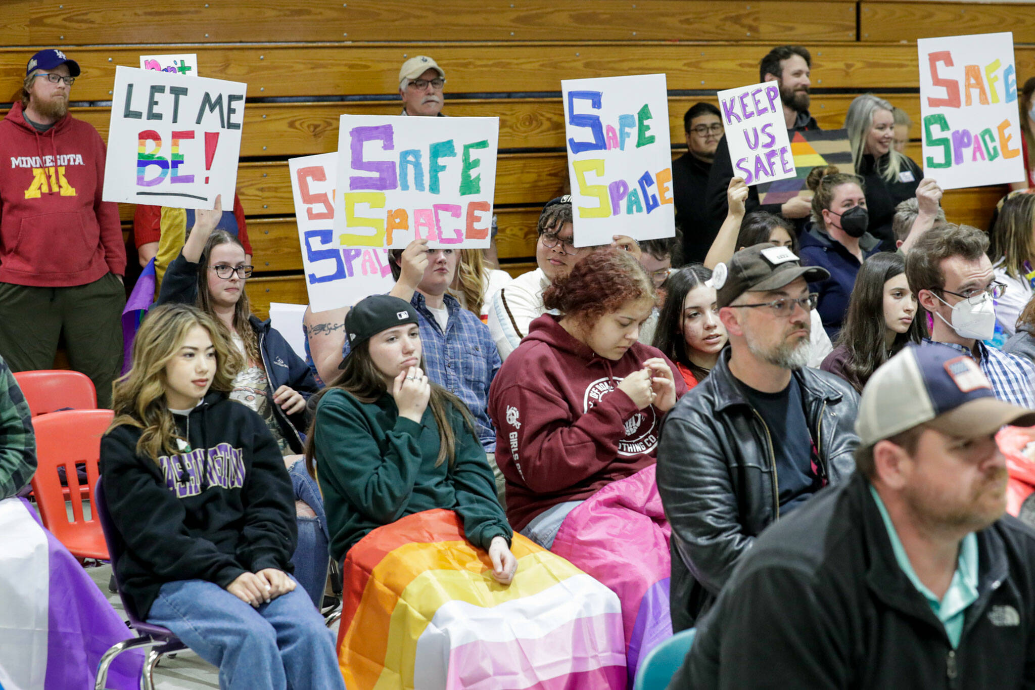 Students, parents and community leaders attend the school board meeting Monday evening at Cedarcrest Middle School in Marysville. (Kevin Clark / The Herald)