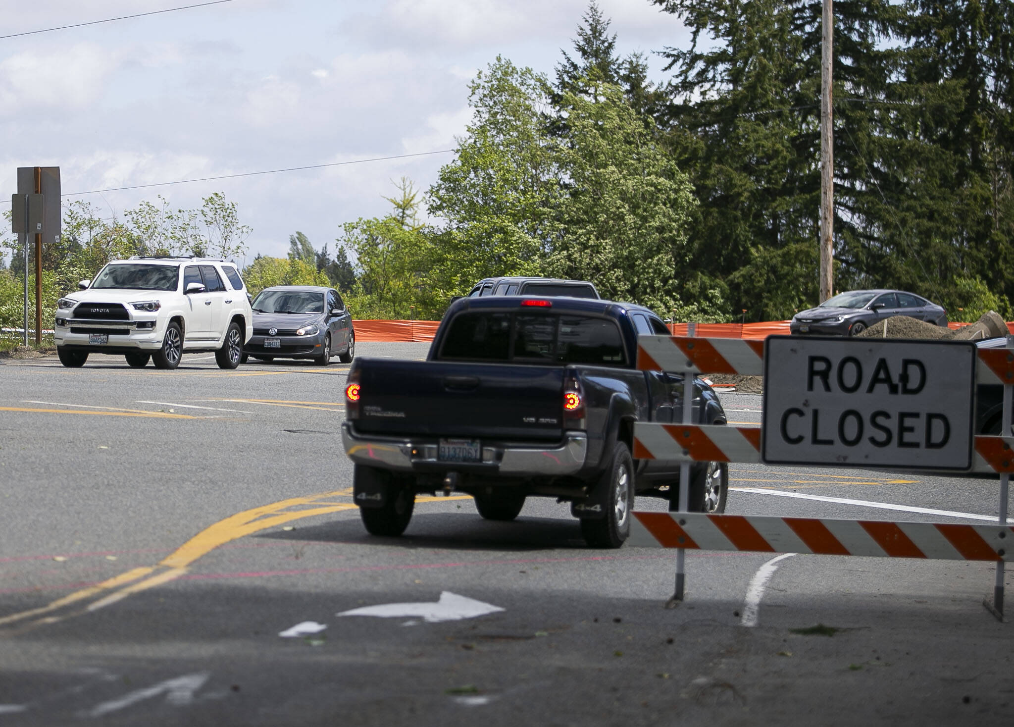 Cars wait to turn onto Highway 9 from Bickford Avenue on Wednesday in Snohomish. (Olivia Vanni / The Herald)